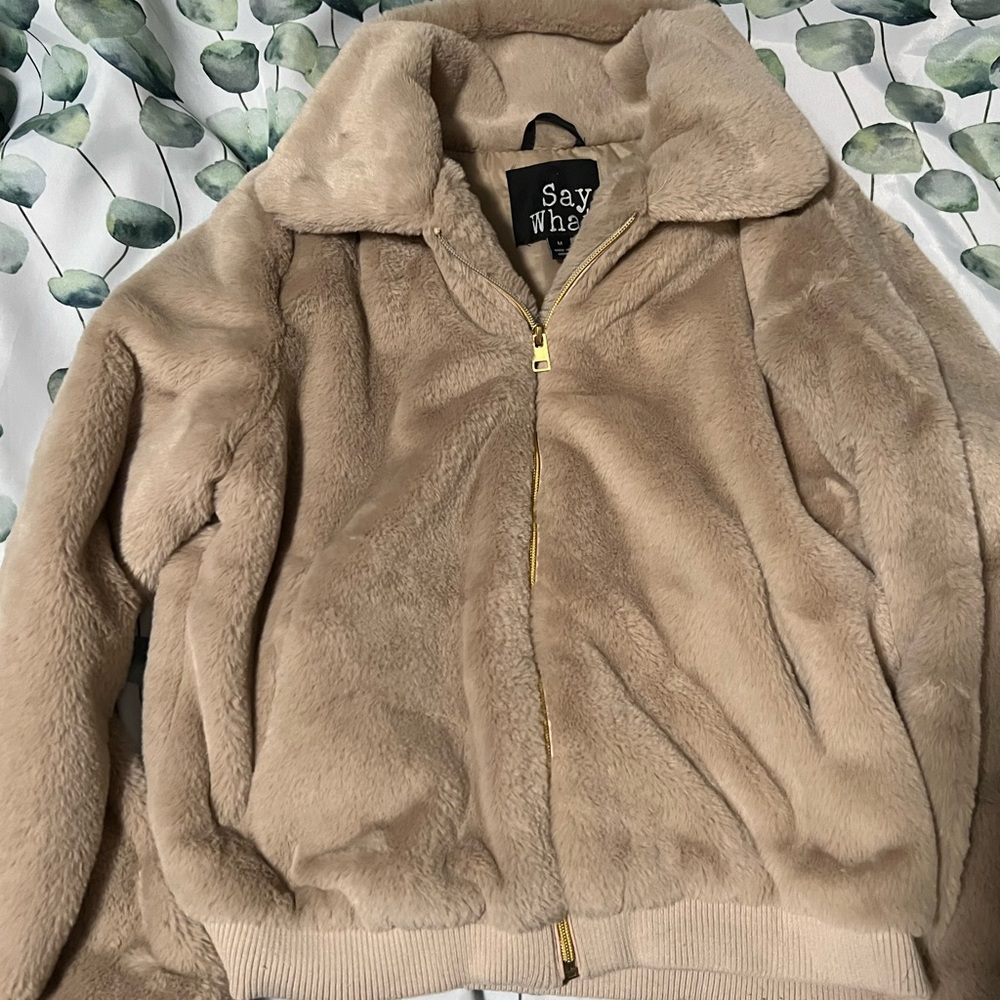 Tan zip up